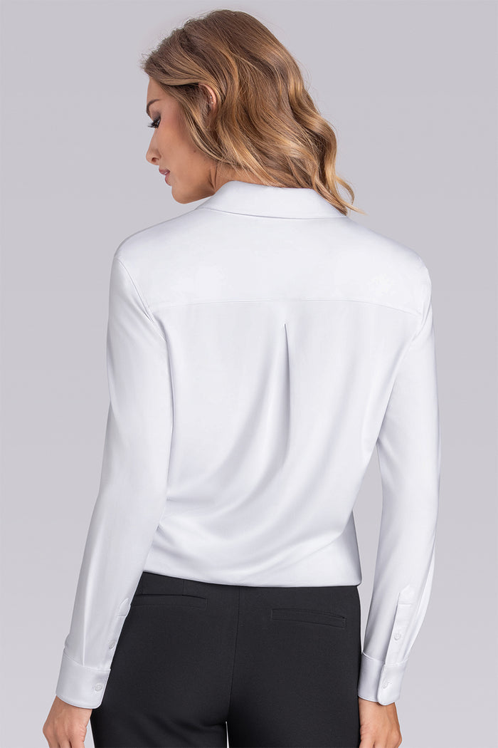Model wearing Idol White Icy Bamboo® long sleeve classic collar shirt, styled with black pants.