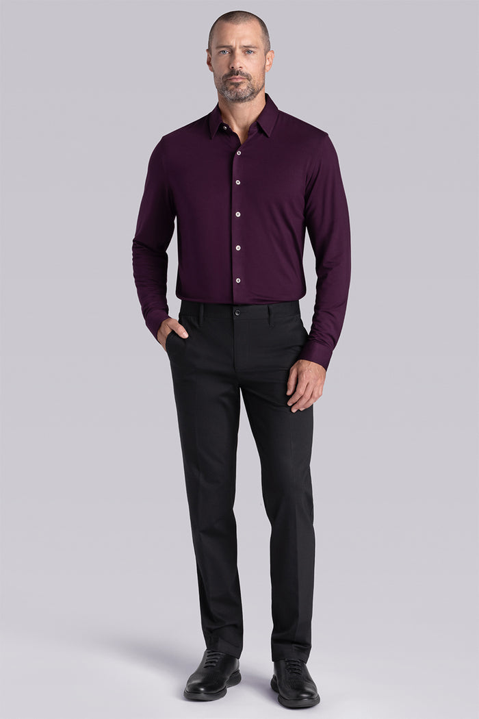 Model wearing Illustrious Plum Icy Bamboo® long sleeve dress shirt styled with black pants