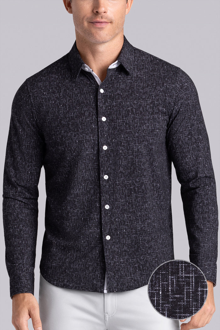 Model wear Integrity Black Icy Cotton® long sleeve classic collar shirt, styled with white pants.