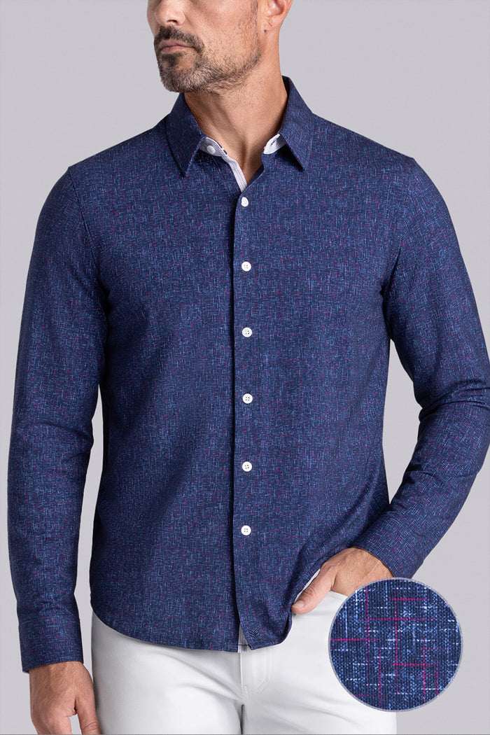Model wear Integrity Navy Icy Cotton® long sleeve classic collar shirt, styled with white pants.