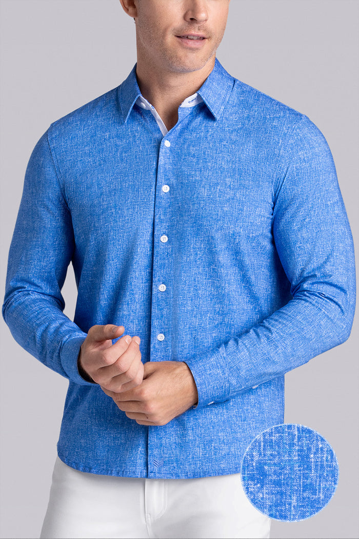 Model wear Integrity Ocean Blue Icy Cotton® long sleeve classic collar shirt, styled with white pants.