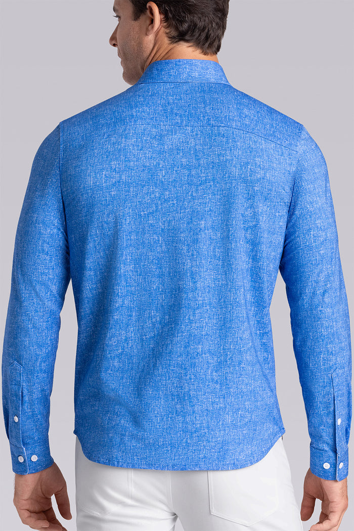 Model wear Integrity Ocean Blue Icy Cotton® long sleeve classic collar shirt, styled with white pants.