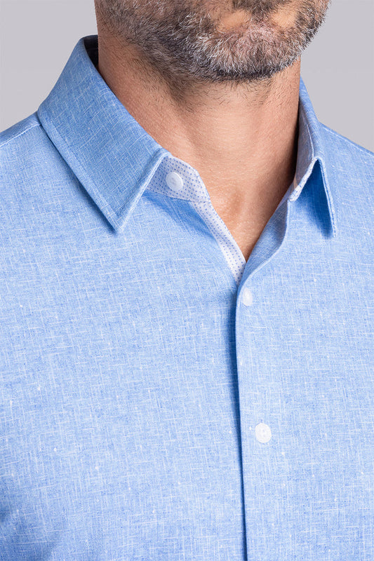 Model wear Integrity Sky Blue Icy Cotton® long sleeve classic collar shirt, styled with black pants.