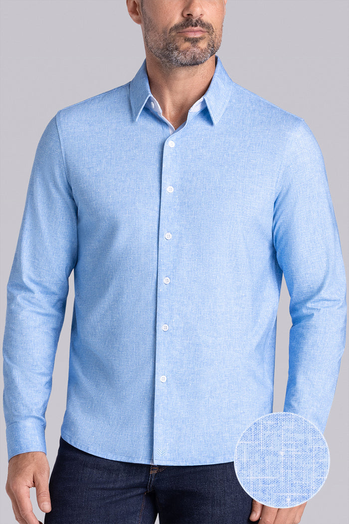 Model wear Integrity Sky Blue Icy Cotton® long sleeve classic collar shirt, styled with black pants.