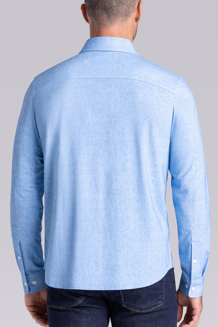 Model wear Integrity Sky Blue Icy Cotton® long sleeve classic collar shirt, styled with black pants.