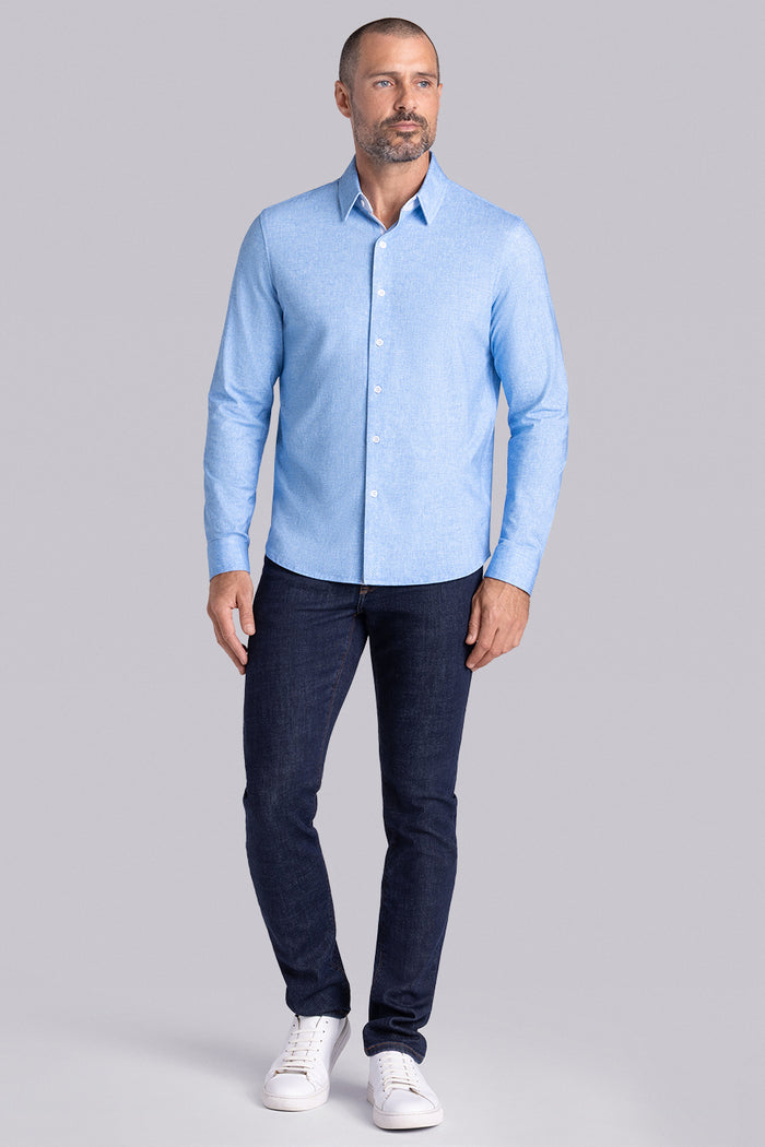 Model wear Integrity Sky Blue Icy Cotton® long sleeve classic collar shirt, styled with black pants.