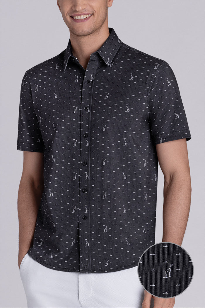 Model wear Intrepid Black short sleeve print shirt, styled with white shorts.