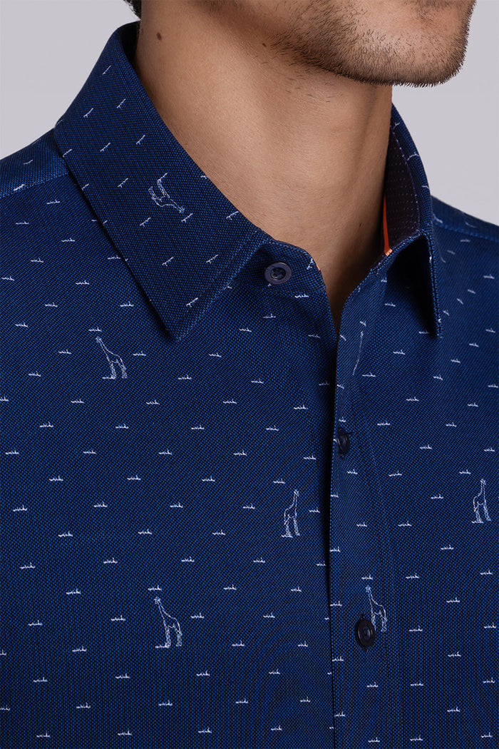 Model wear Intrepid Dark Navy short sleeve print shirt, styled with white shorts.