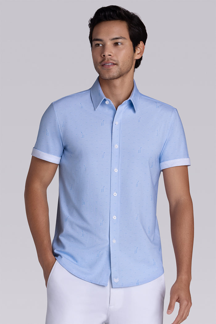 Model wear Intrepid Light Blue short sleeve print shirt, styled with white shorts.