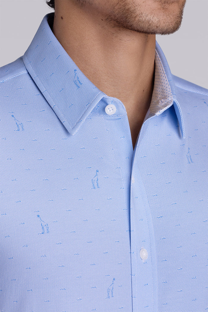 Model wear Intrepid Light Blue short sleeve print shirt, styled with white shorts.