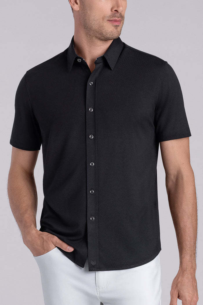 Model wear Intrigue Black Icy Bamboo® short sleeve collar shirt, styled with white pants.