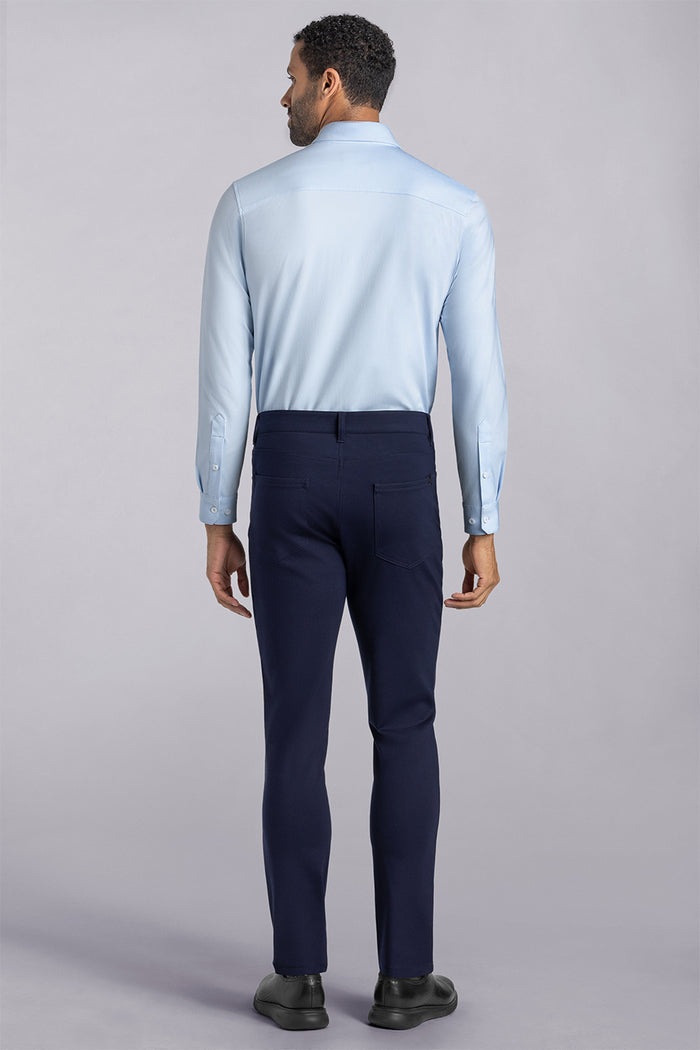 Model wearing Kinetic Navy dress slacks pants, styled with comfortable country air shirt