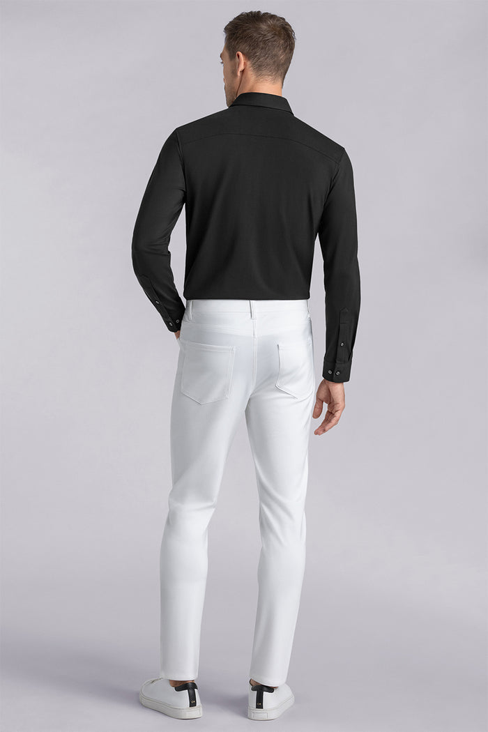 Model wearing Kinetic white dress slacks pants, styled with comfortable black shirt