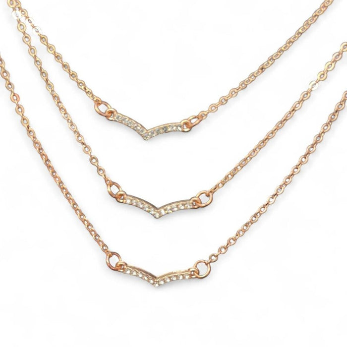 Layered gold necklace with diamond