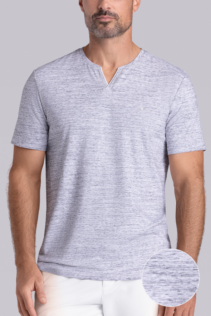 Model wear Lucid Bone White Heather Icy Cotton® short sleeve v-notch shirt, styled with white shorts