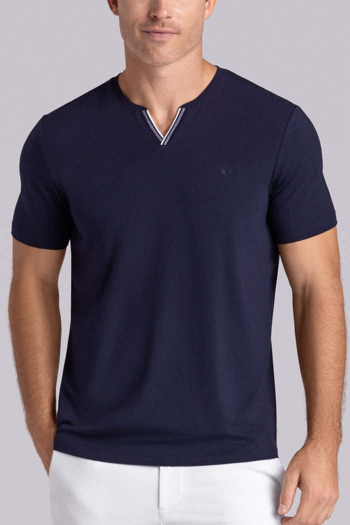 Model wear Lucid Navy Icy Cotton® short sleeve v-notch shirt, styled with white shorts