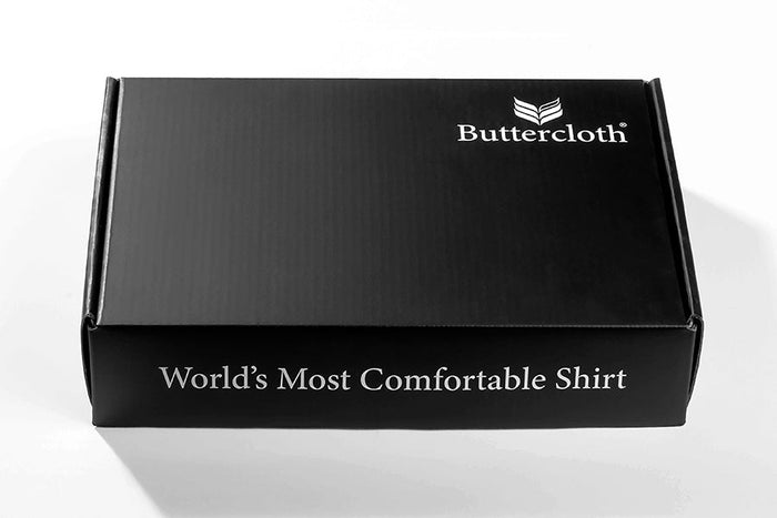 A black luxurious gift box with a black ribbon tied around it.