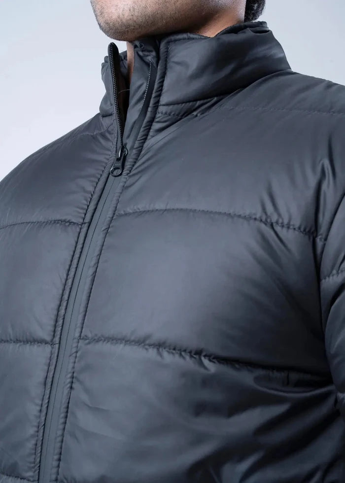 Men's black quilted jacket with high collar and full-length front zipper