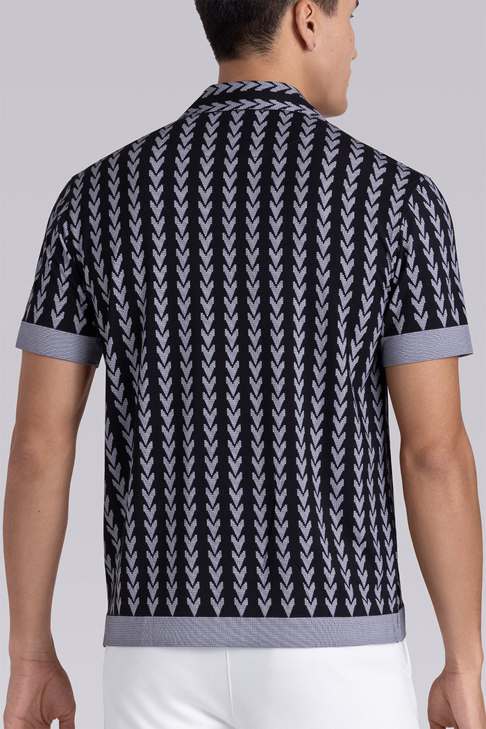 Model wear Mirage Black Icy Bamboo® short sleeve camp shirt, styled with white shorts