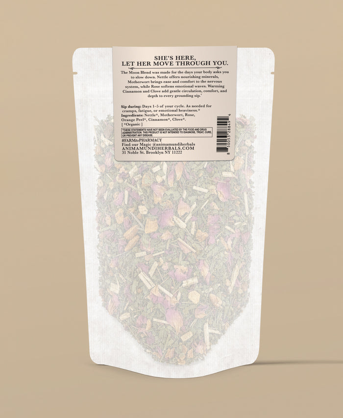 A stand-up pouch of herbal tea with the back label facing the camera, set against a solid beige background. The pouch is semi-transparent, revealing dried flowers and leaves inside.