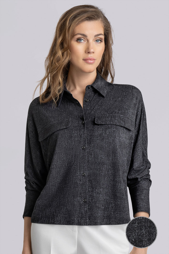 Model Motif Black Charcoal long sleeve button up blouse, styled with white pants