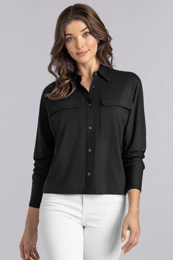 Model Motif Black long sleeve button up blouse, styled with white pants
