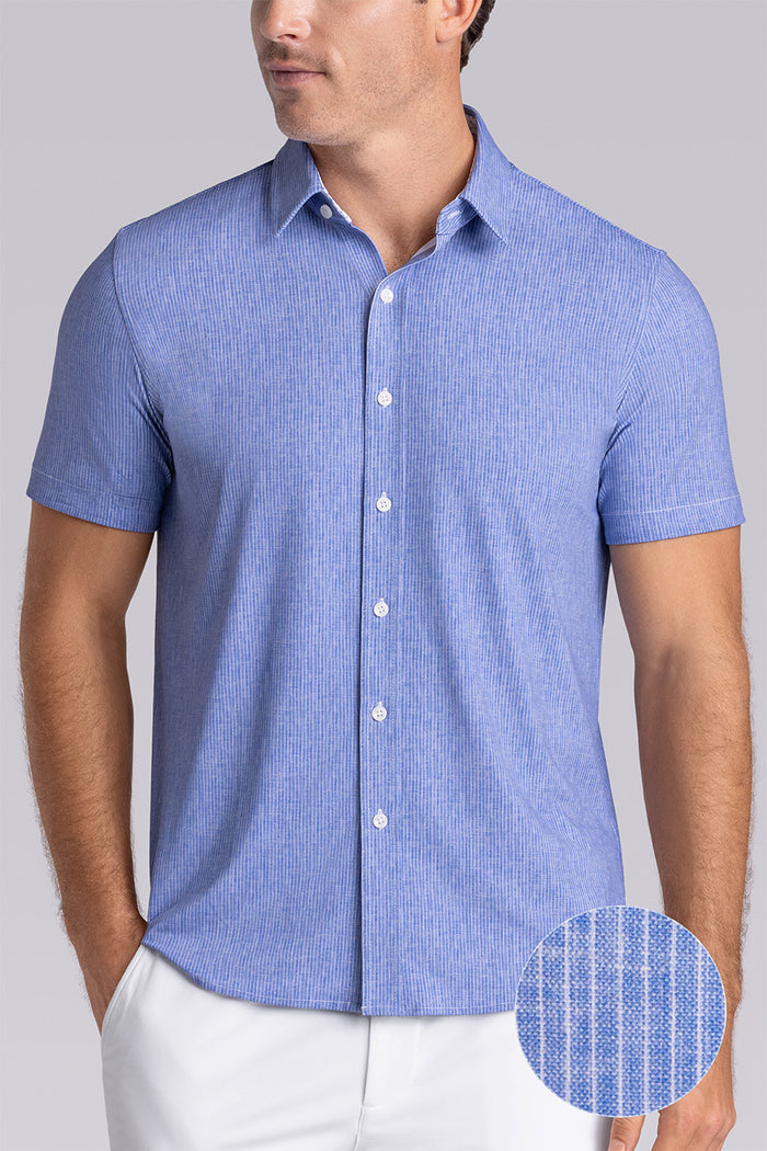 Model wearing Ocean Drive Palace Blue short sleeve button-up shirt, styled with white shorts