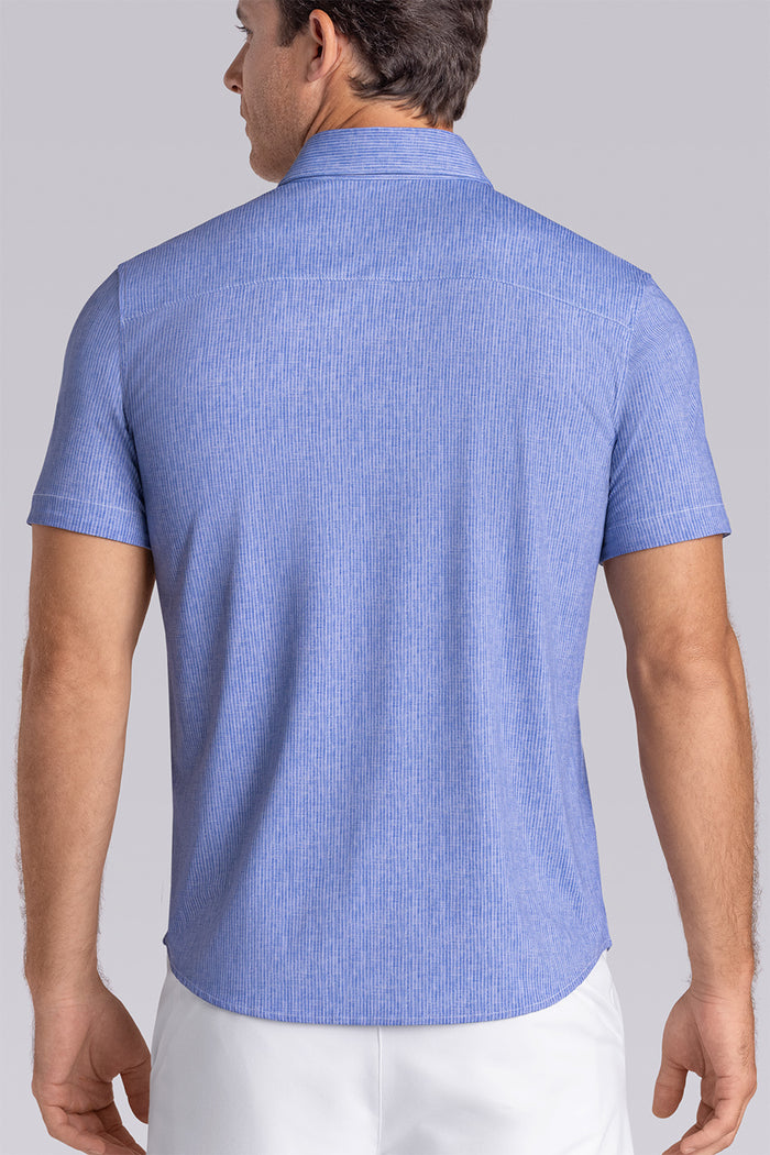 Model wearing Ocean Drive Palace Blue short sleeve button-up shirt, styled with white shorts