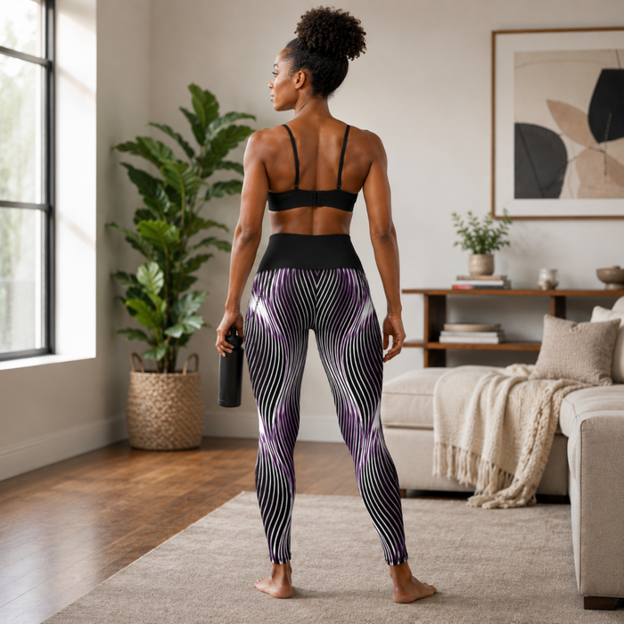 Back view of a woman wearing the Orot Series OR ARGAMAN purple leggings with a symmetrical wavy line design.