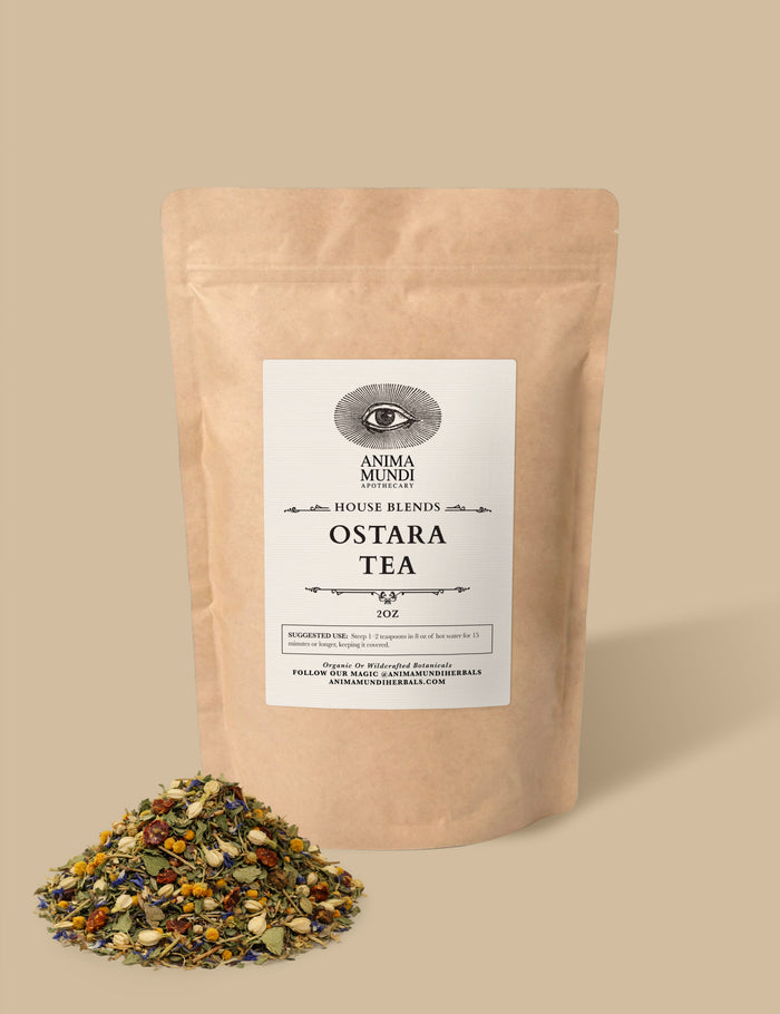 Kraft paper tea bag labeled 'Ostara Tea' with loose tea leaves on a beige background