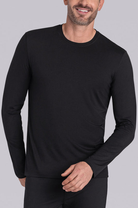 Model wearing Paramount Black long sleeve Icy Bamboo® crewneck, styled with black pants.
