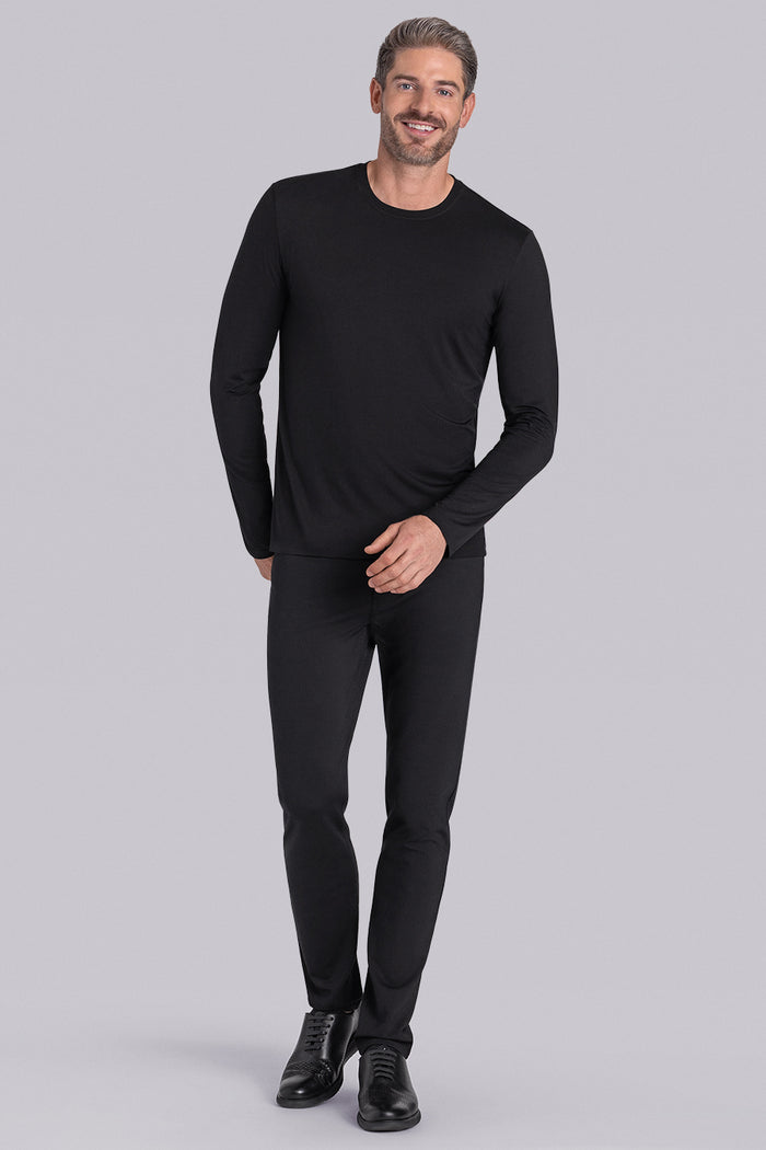 Model wearing Paramount Black long sleeve Icy Bamboo® crewneck, styled with black pants.