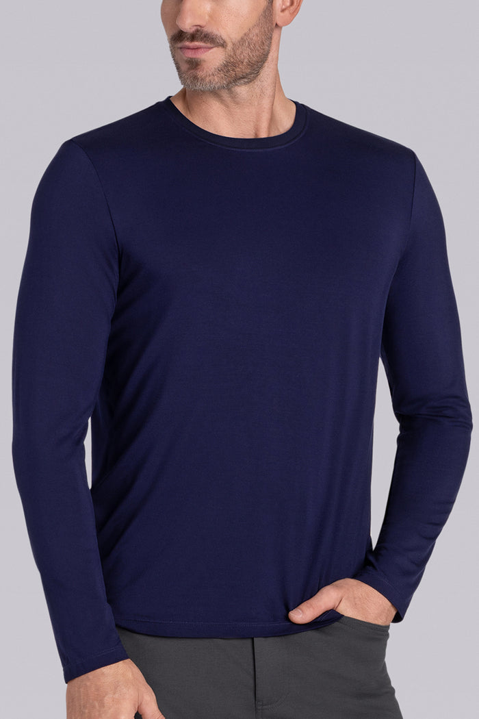 Model wearing Paramount Navy long sleeve Icy Bamboo® crewneck, styled with grey pants.