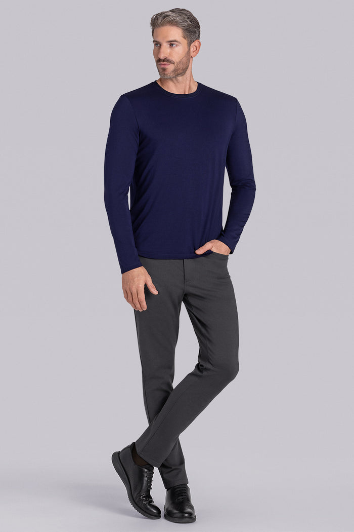 Model wearing Paramount Navy long sleeve Icy Bamboo® crewneck, styled with grey pants.