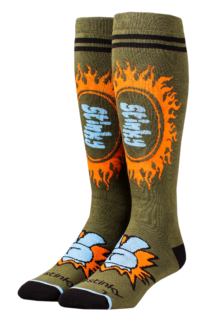 Pair of green socks with orange and blue flame design on a white background