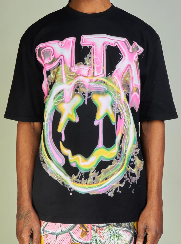 Close-up of black and pink Politics PLTX Graphic Tee on a hanger