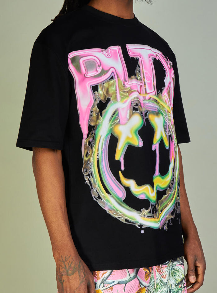 Back view of black and pink Politics PLTX Graphic Tee showing the logo and text detail