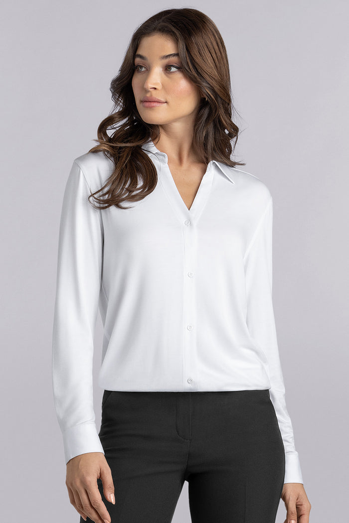 Model wearing Prestige White long sleeve Icy Bamboo® v-neck shirt, styled with black pants