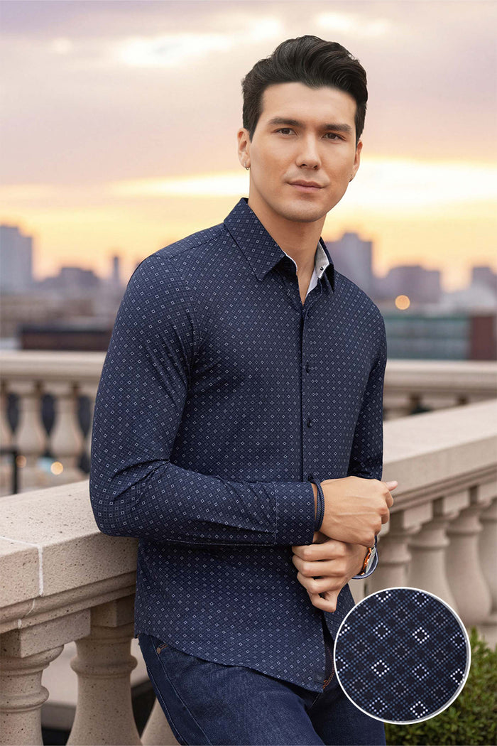 Model wearing Prism Black 6-Way Knit® long sleeve classic collar shirt, styled with black pants
