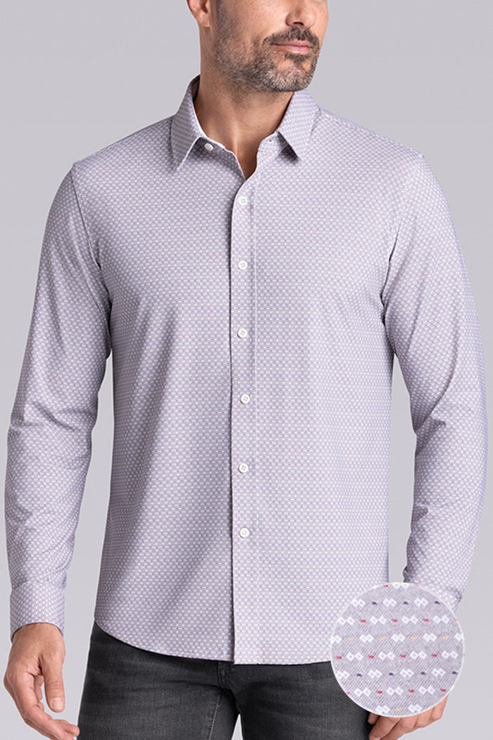 Model wearing Prism Chateau Grey 6-Way Knit® long sleeve classic collar shirt, styled with grey jeans