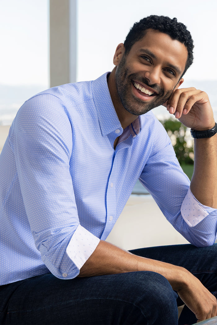 Model wearing Pulse Airy Blue Icy Cotton® long sleeve classic collar shirt, styled with black pants