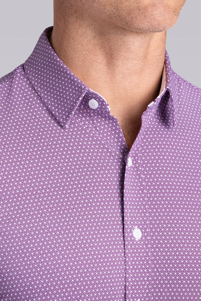 Model wearing Pulse Plum Icy Cotton® long sleeve classic collar shirt, styled with white pants