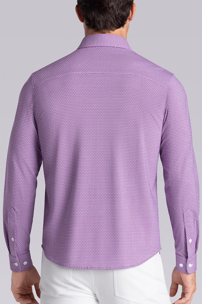 Model wearing Pulse Plum Icy Cotton® long sleeve classic collar shirt, styled with white pants