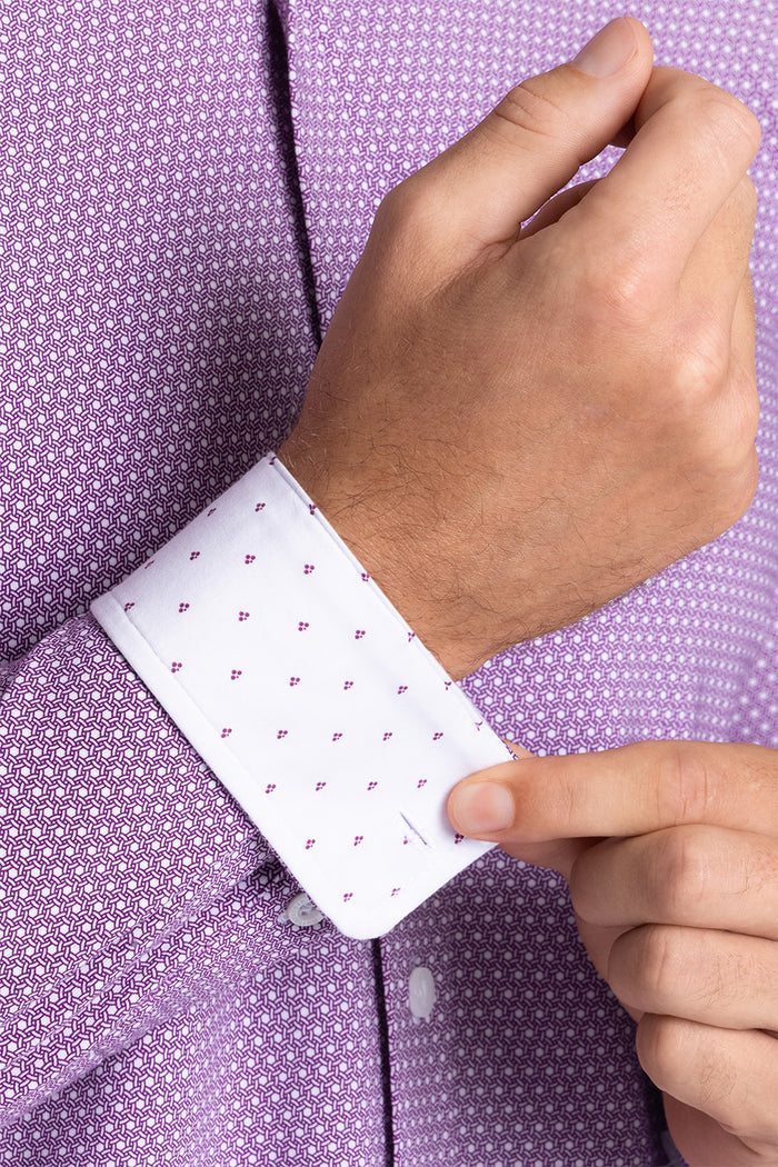 Model wearing Pulse Plum Icy Cotton® long sleeve classic collar shirt, styled with white pants
