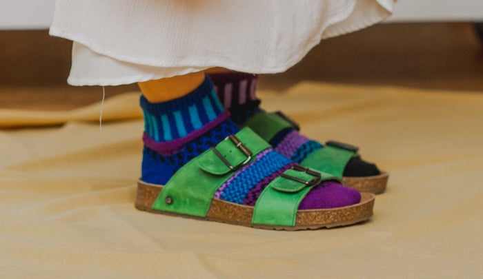 Person wearing Raspberry Quarter Socks with green sandals
