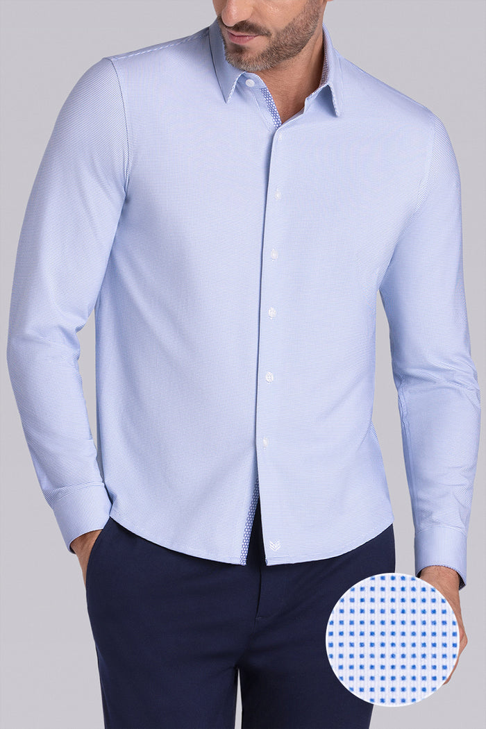 Model wearing Renowned Light Blue Icy Cotton® long sleeve casual shirt with collar placket, styled with navy pants