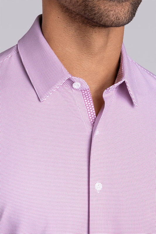 Model wearing Renowned Magenta Icy Cotton® long sleeve casual shirt with collar placket, styled with navy pants