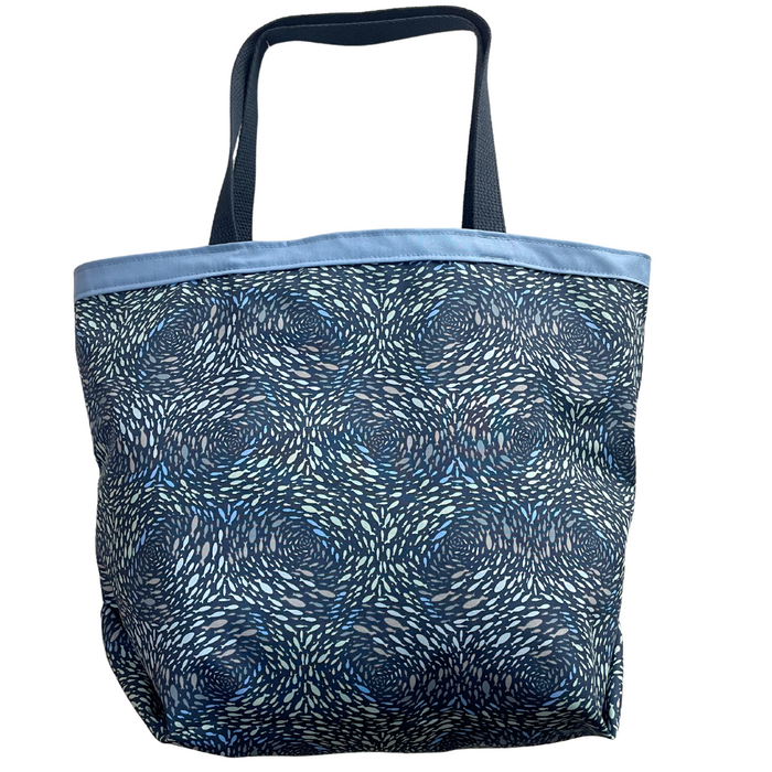 It's easy to ditch the plastic&nbsp;bag with this fun and functional classic market tote.


Great as gifts and as additions to your sustainable lifestyle.
Size: 18" wide x 13.5" tall x 6" gusseted bottom
Materials: 100% cotton with cotton liner and webbing.
Care: Easy wash and dry on normal settings