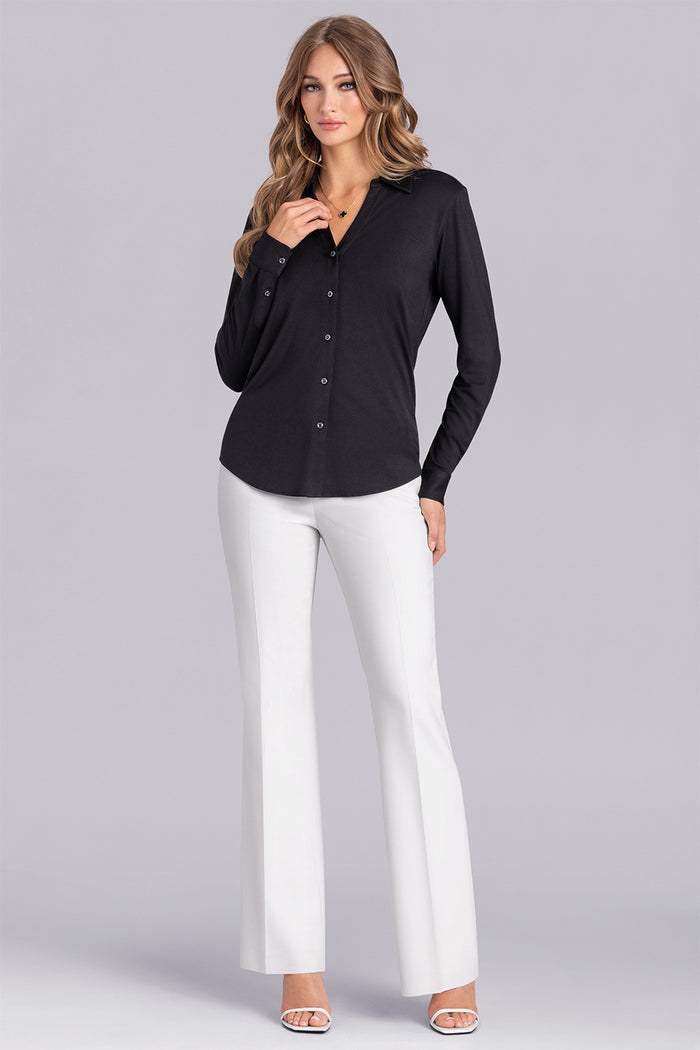 Model wearing Sophistication Black Icy Bamboo® long sleeve button shirt, styled with white pants