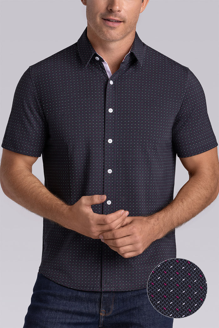 Model wearing Spark Black Icy Cotton® short sleeve classic collar shirt, styled with black pants